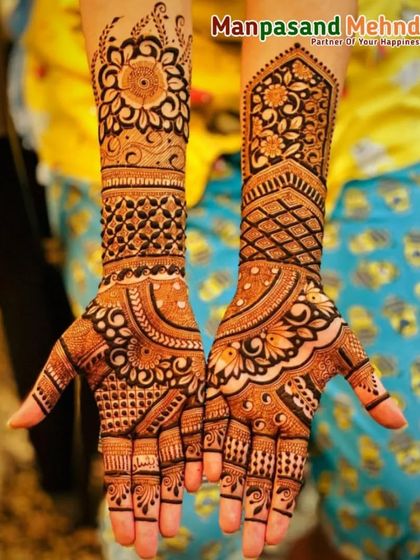 A beautiful floral and geometric design that is both modern and intricate. The pattern covers the hand in a way that is elegant and not overwhelming.