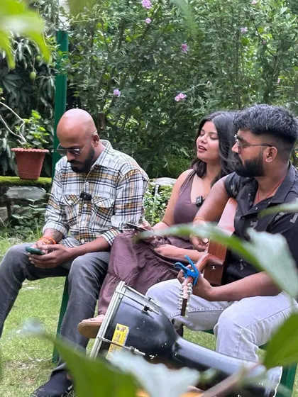 Guests collaborate on a song in the garden of Renz Himalayan Retreat during our music retreat. We create spaces for connection, creativity, and shared experiences in nature.