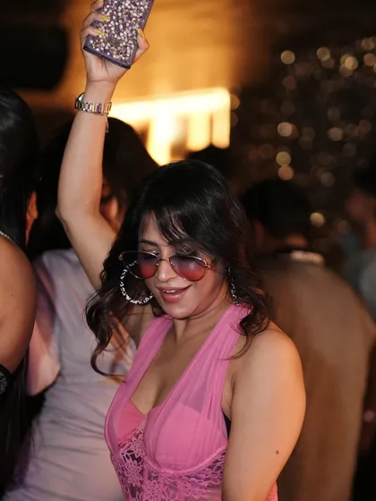 A guest dancing her heart out at Kaze. The energy is always high.