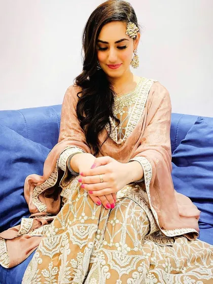 Another shot of the detailed styling for Sweetaj Brar. The intricate embroidery on the sharara pants and the soft, flowing dupatta were key elements in crafting this sophisticated traditional outfit.