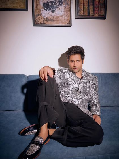 Whether it’s a festive function or a late-night party, this leaf-print blazer and trouser set from the Sukoon collection moves with you stylishly and unapologetically.