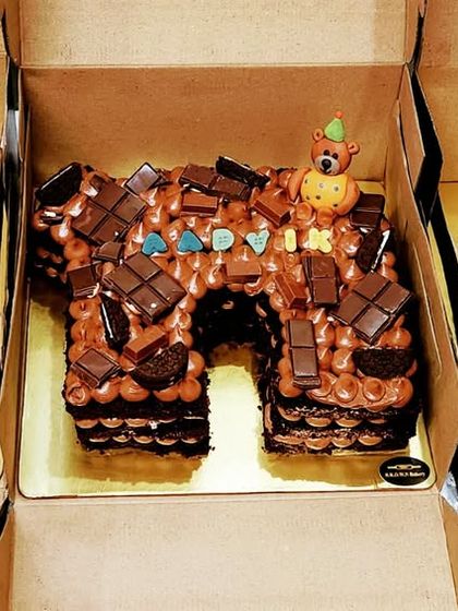 A special order for Aadvik's first birthday, featuring three of our bestselling number cakes: a fruit cake, a chocolate overload cake, and another fruit cake.