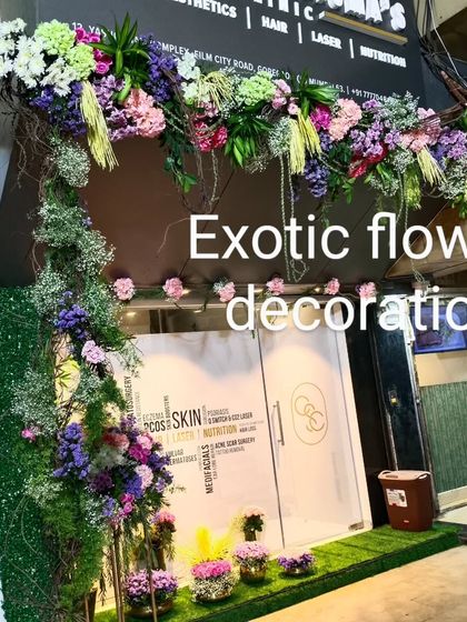 We also decorate commercial spaces. This floral entrance for a skin clinic uses a mix of purple, pink, and green florals to create an inviting and high-end look for the business.