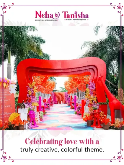 Step into a world of color and joy. We specialize in executing creative themes with flair, as seen in this vibrant, artistic entrance with multi-colored arches, florals, and quirky giraffe props.
