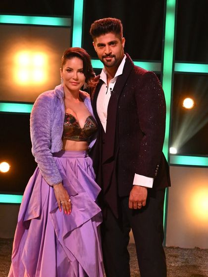 Host Tanuj Virmani with the lovely Sunny Leone, looking sharp in our maroon embellished tuxedo on the set of MTV Splitsvilla.