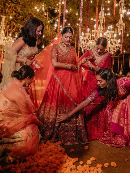A bride and her bridesmaids. This candid moment, filled with love and support, is what it's all about. I make sure the timeline flows smoothly so there's plenty of time for these important memories.