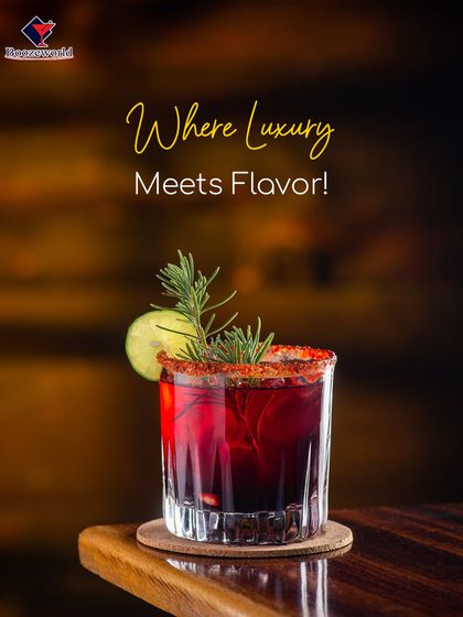 This deep red cocktail with a spiced rim and a rosemary garnish is where luxury meets flavor. The rich color and aromatic herbs create a sophisticated and indulgent sipping experience.