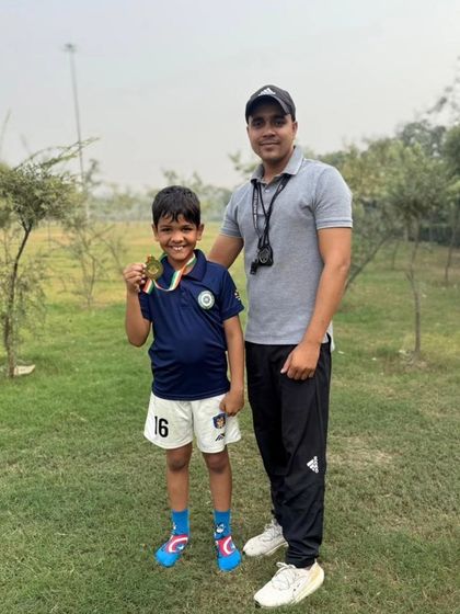 Another shot with my student, showcasing the result of his hard work in our athletics program.