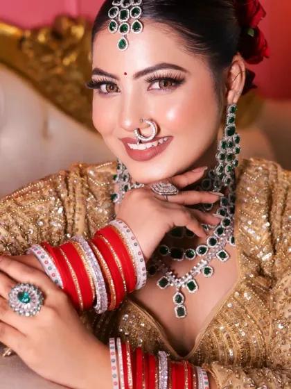 A happy, smiling bride. The student's makeup work looks radiant and stays perfect, showcasing the long-lasting techniques we teach.