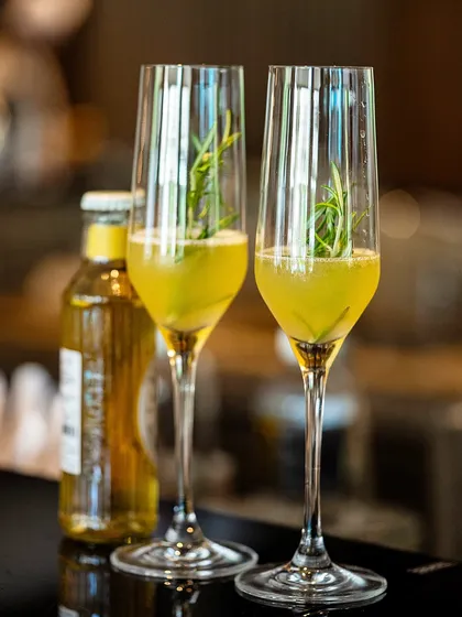 Our Summer Cooler Brunch features refreshing drinks like these herb-infused sparkling beverages. They are the perfect accompaniment to a light, seasonal meal by the pool.