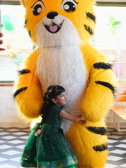 Nothing beats the look of pure joy when a child meets their favorite character. I can arrange for friendly mascots, like this giant cuddly tiger, to visit your party, creating amazing photo opportunities and interactive fun for all the guests.