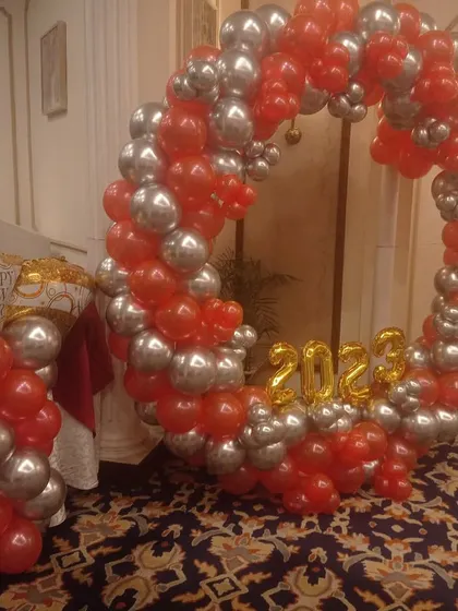 A New Year's Eve party decoration at Le Meridien hotel. The red and silver balloon ring with "2023" foil numbers was a great spot for photos.