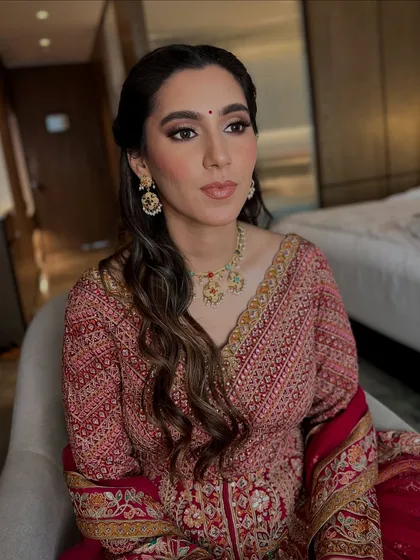 The final look for Adhya's pre-wedding function, completely unedited. Her skin is radiant and the soft glam makeup enhances her features without masking her natural beauty.