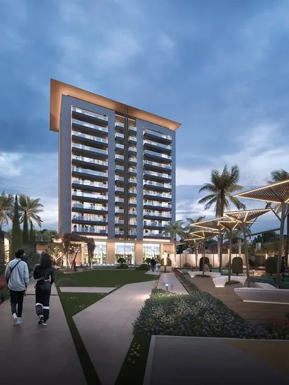 A twilight render of Gulnaar Zenium, showcasing the thoughtful lighting design that enhances the modern architecture and landscaped gardens in the evening.
