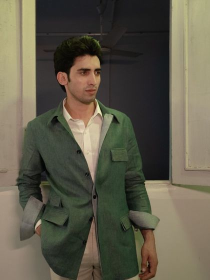 Step into the safari in style with our deep green safari jacket, showcasing Italian elegance at its finest.