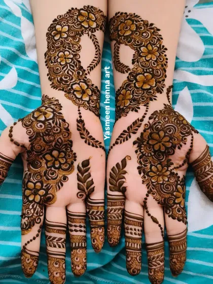 A delicate and modern design with hanging leaf tassels. This style is light, airy, and very popular for festive occasions.