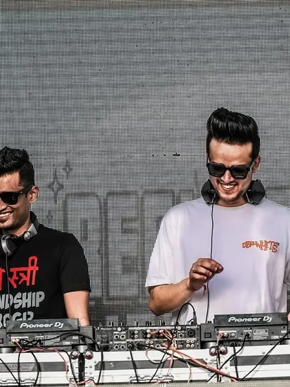 All smiles while playing a b2b set. The joy of creating music with friends.