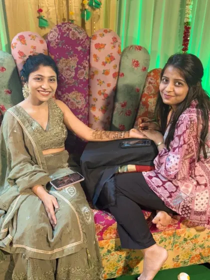 Me with a happy bride during her mehendi session. Building a connection with my clients is an important part of the process.