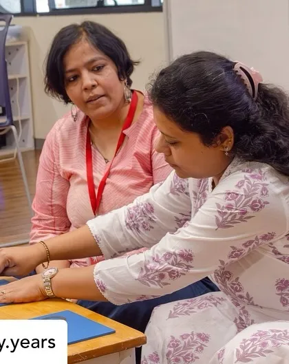 Two teachers from Kai Early Years work with the geometric cabinet cards. This exercise helps them appreciate how Montessori materials isolate specific qualities to help children build clear mental concepts.