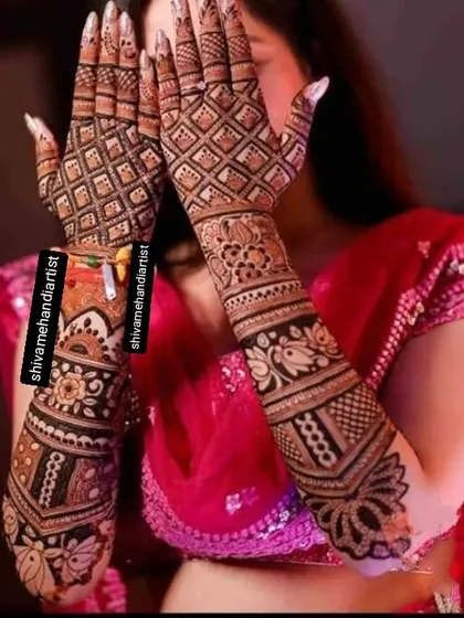 A beautiful pattern-based design for the back of the hands, featuring a mix of floral motifs and geometric grids.