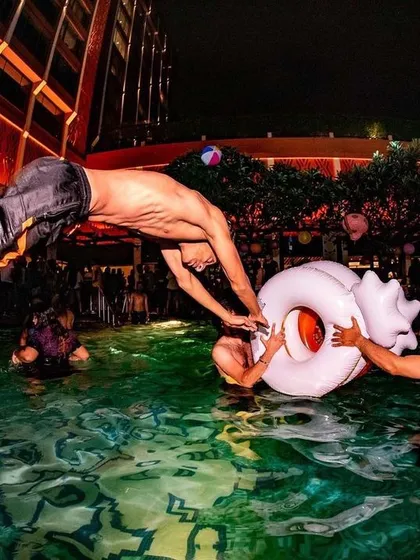 It's not just about the club. I bring the party to the pool too. This shot from a GETLOUD Pool Party shows the wild, high-energy fun we have at my sundowner and daytime events.