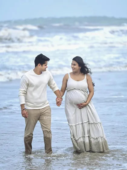 A relaxed maternity session on the beach, using the natural light and ocean backdrop to create a serene and beautiful portrait of the expecting couple.