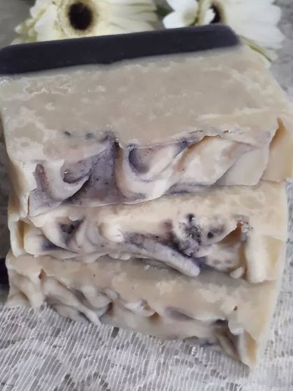 A beautiful stack of my handmade Lush Lavender soap, showcasing the natural swirls and textures that make each bar special.