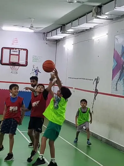 How about a friendly game of basketball? It's one of the many sports you can choose for your party. Our coaches guide the kids, ensuring everyone gets a chance to play, pass, and shoot for the hoop, no matter their skill level.
