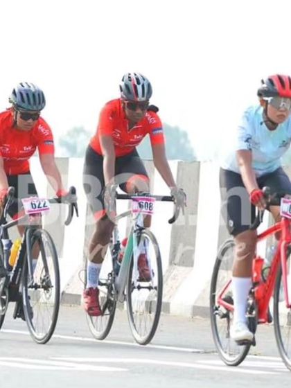 The women's race, with three riders in a breakaway, shows the tactical side of the sport.