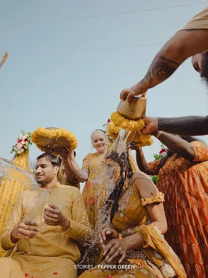 A wide shot of Medhus and Adi's Haldi ceremony, showing the involvement of all the friends and family. It truly captures the spirit of a community celebration.