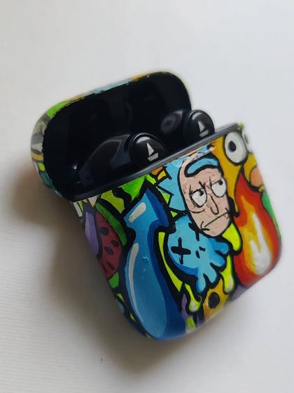 Even your earphone case can be a piece of art. I did this doodle-style custom on a boAt earpod case, featuring characters like Rick from Rick and Morty and Homer from The Simpsons.