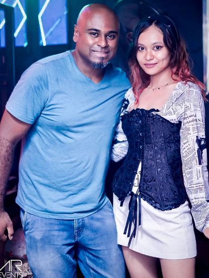 Posing with a guest.