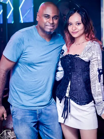Posing with a guest.