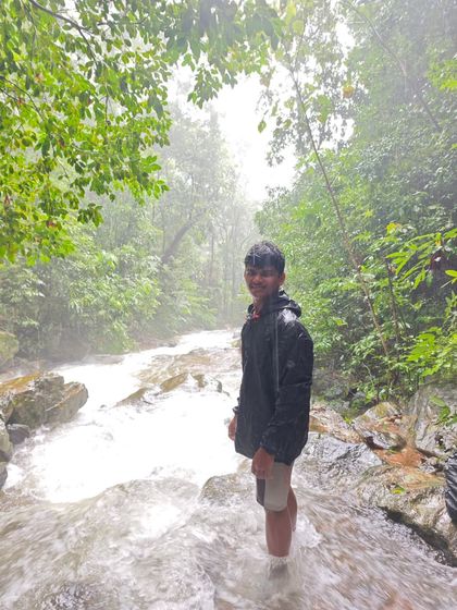 Wading through a river during our Sharavathi Valley trek. It's a refreshing and adventurous part of the journey to reach hidden waterfalls.