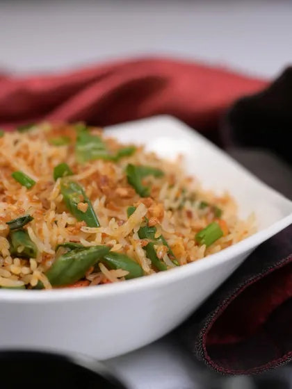 Our Burnt Garlic Fried Rice is a customer favorite for a reason. The irresistible crunch and savory flavor make it the perfect companion to any of our gravies.