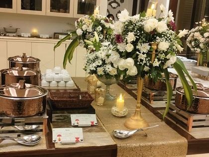 A beautiful table layout for a milestone anniversary celebration. I take pride in creating setups that are as special as the occasion itself.