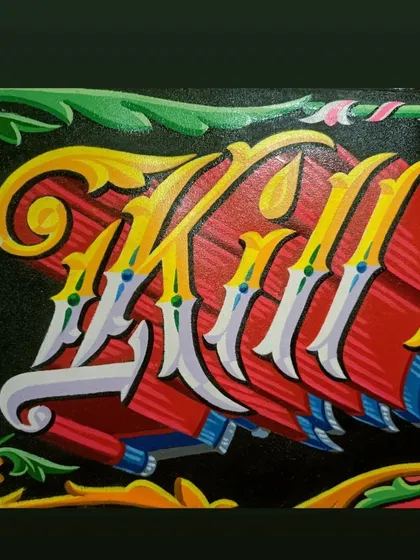 A view of the lettering showing the layers of color.
