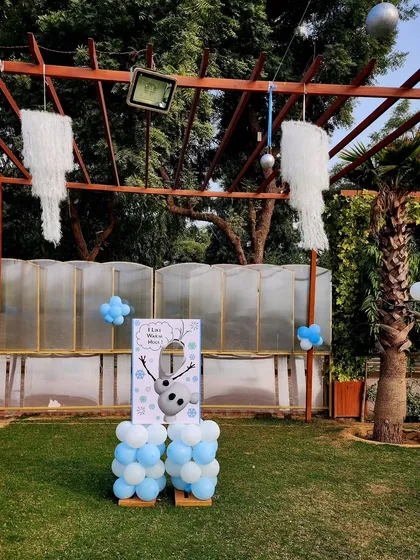 A fun "Pin the Nose on Olaf" game station set up in the party area. I love incorporating themed activities to keep the little guests entertained throughout the event.