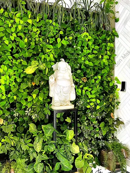For those who want a truly living piece of art, I create thriving bio-walls like this one. The dense, real foliage not only looks beautiful but also helps purify the air, and the serene Buddha statue adds a touch of tranquility.