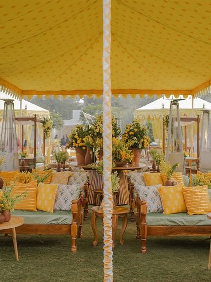 A symmetrical view of the lounge seating, showcasing the vibrant yellow and green color palette.