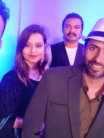 A candid selfie of the band members during the Four Seasons gig.