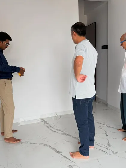 The traditional coconut-breaking ceremony to mark the auspicious start of a new interior design project.