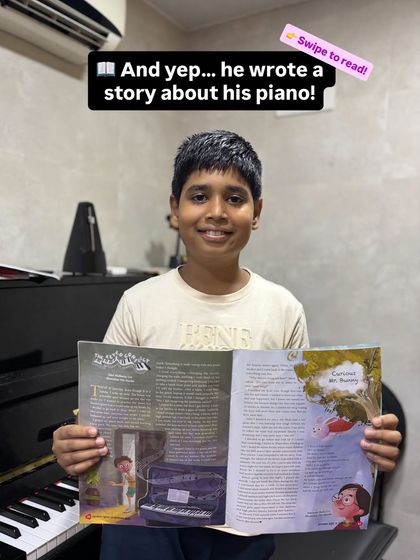 Our young pianist Saket was featured in a children's magazine for a story he wrote about his piano. Here he is, proudly holding his published work.