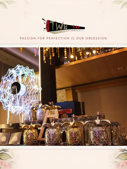 A unique shot wheel and pineapple-themed glassware, adding a fun and interactive element to a Sangeet party bar.
