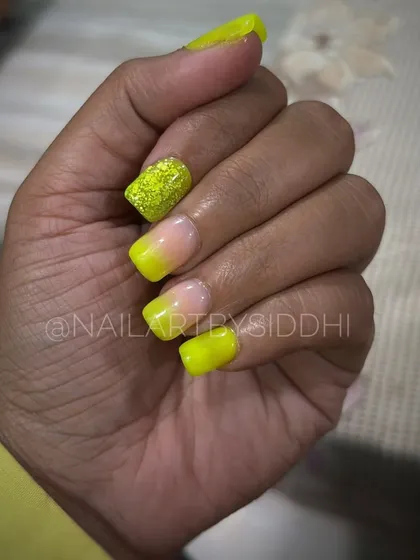 A bold and bright neon yellow ombre, perfect for summer or for anyone who loves a vibrant look.