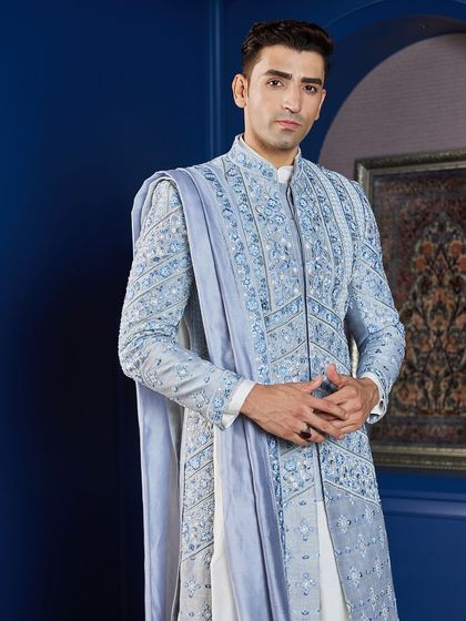 The complete look, featuring the powder blue sherwani with a matching stole and safa. This is a perfect example of how I use color and texture to create a modern royal statement.