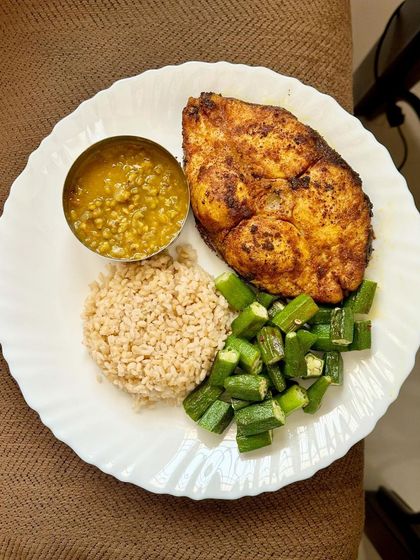 A repeat of the delicious high-protein meal with pan-fried kingfish, broken wheat, dal, and sautéed okra.