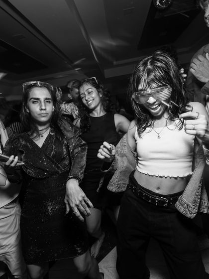 Guests dancing with style at a club event. I can curate a sophisticated vibe with deep house and tech house for more lounge-style or corporate events.