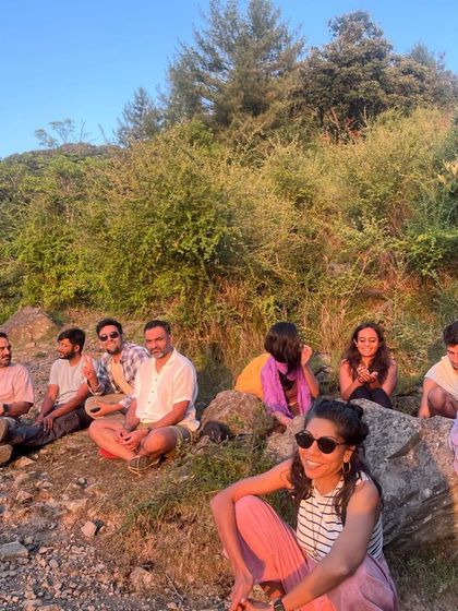 Our group enjoying the golden hour light during a sunset hike. These are the moments where we slow down, breathe, and simply appreciate the immense beauty of the Himalayas.