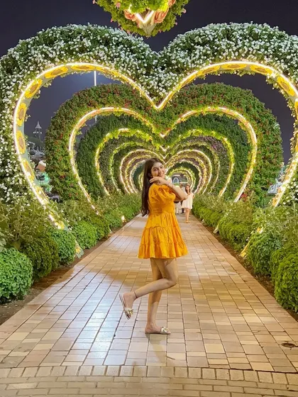 A playful pose in my yellow dress. Your vacation wardrobe should be all about expressing happiness and freedom.